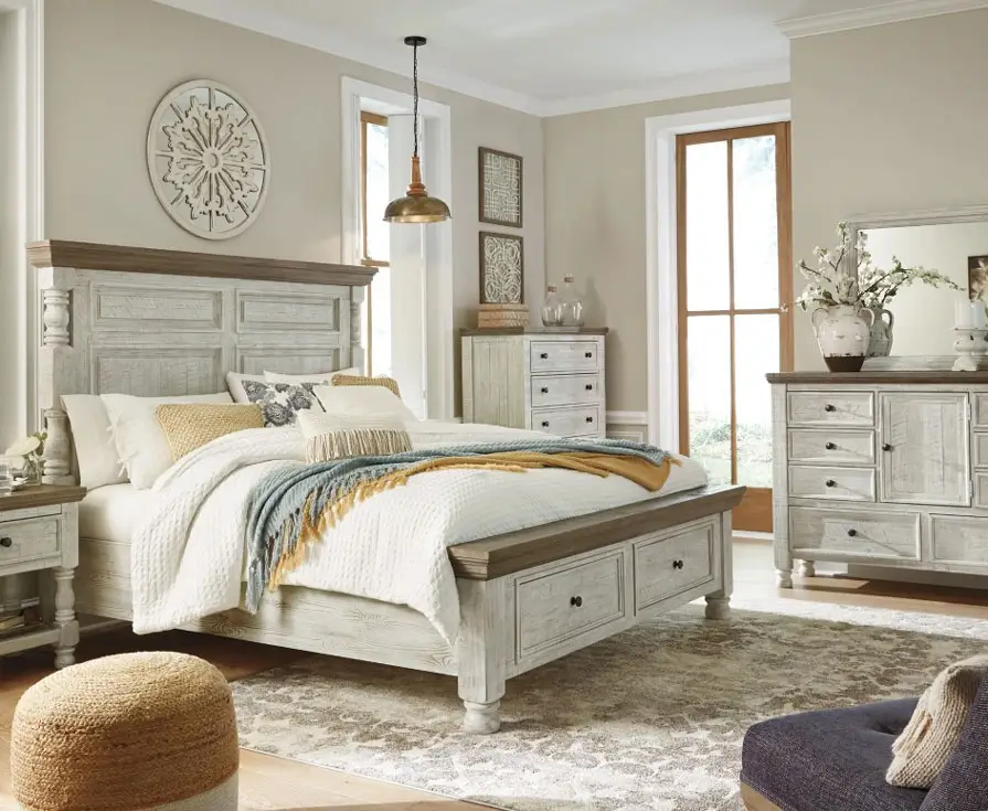Cozy bedroom with rustic furniture and sunlight.
