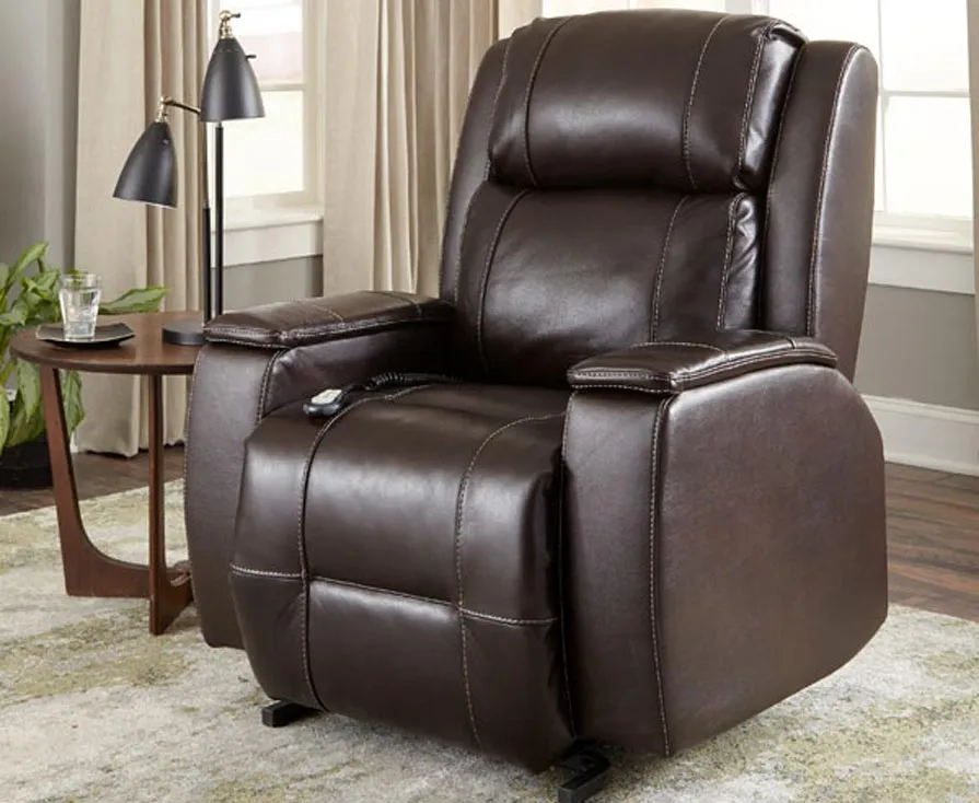 Brown leather recliner chair in a cozy living room.